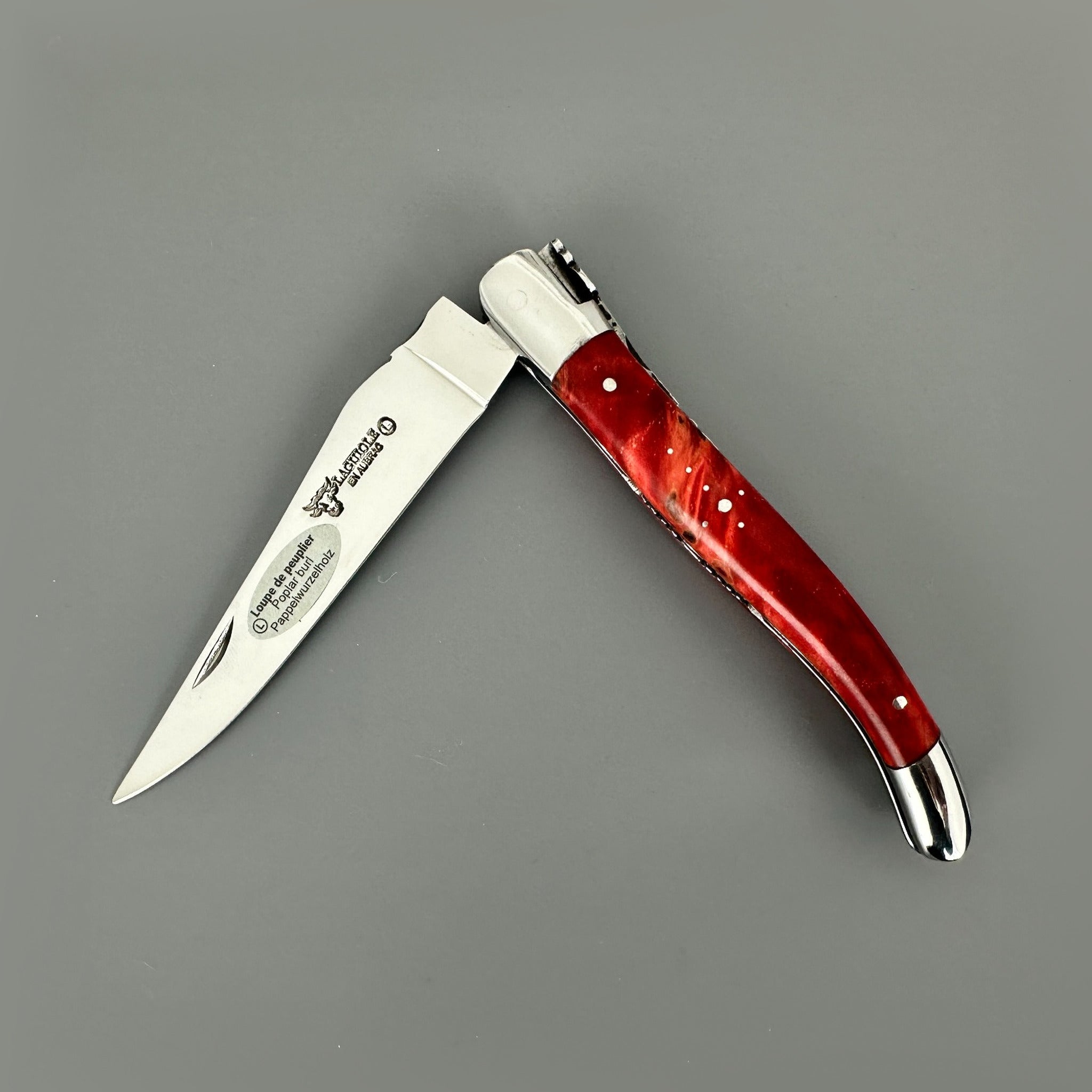 Laguiole en Aubrac Hand Carved Folding Knife, Red Stabilized Poplar Burl