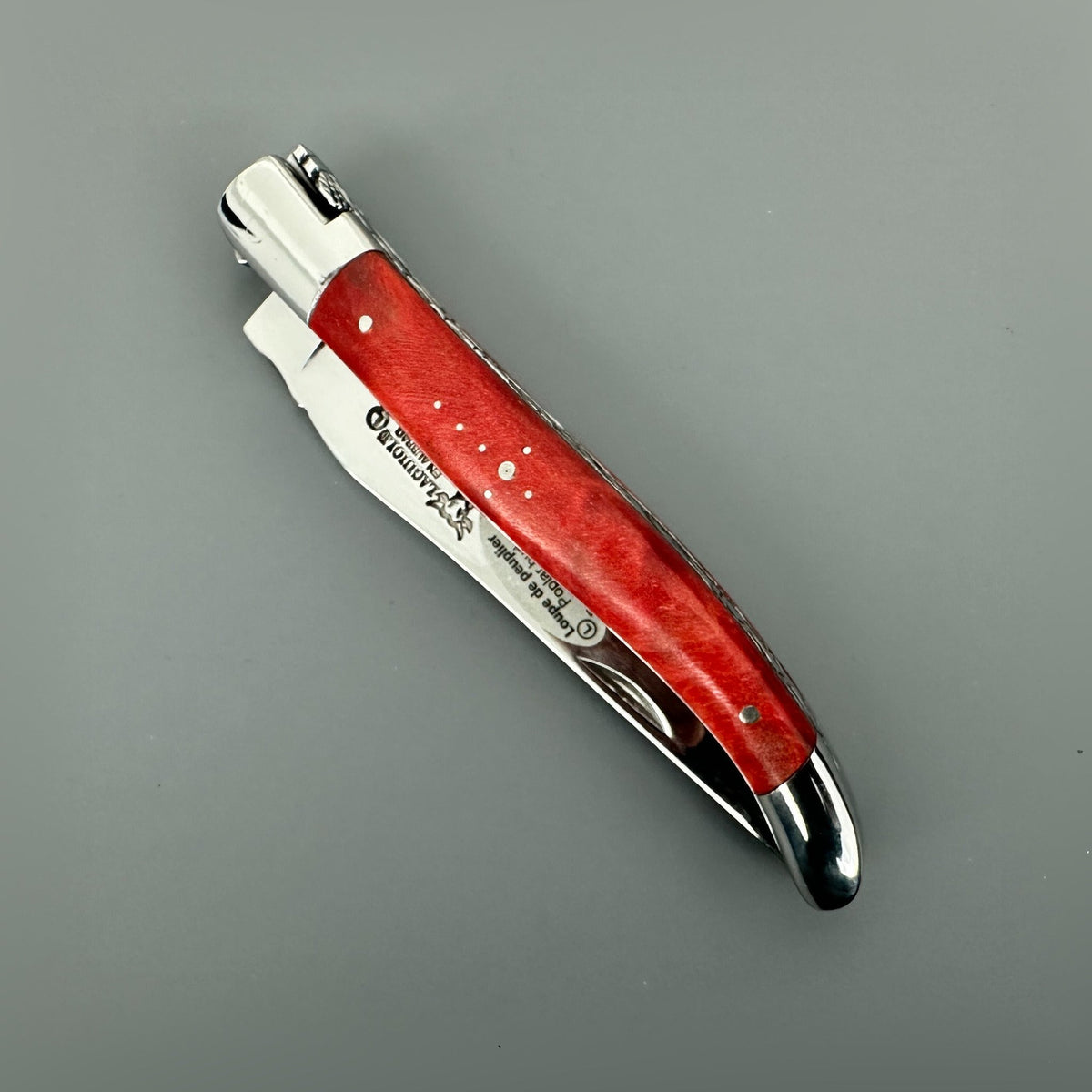 Laguiole en Aubrac Hand Carved Folding Knife, Red Stabilized Poplar Burl